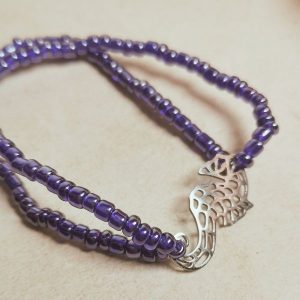 bracelet perle de rocaille bleu a reflet et hippocampe en acier hynoxidable
